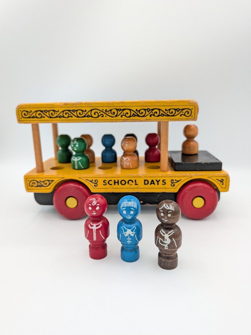 Montgomery Schoolhouse VT Wooden Yellow School Bus Red Wheels Toy Peg People